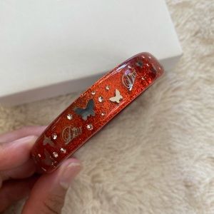 GUARANTEED AUTHENTIC DIOR red acrylic bangle